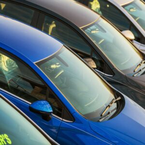 a row of cars at the dealership