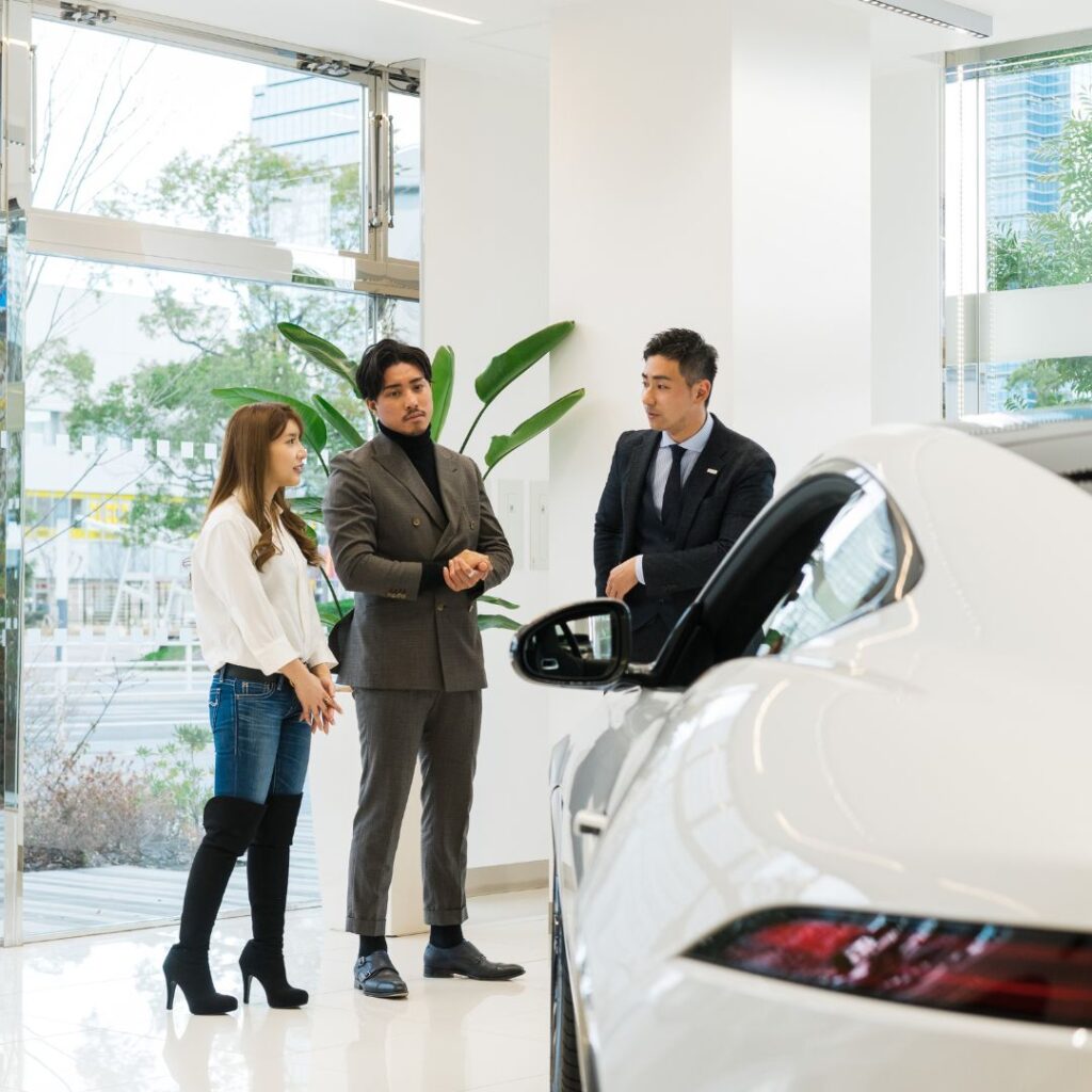 couple at car dealership