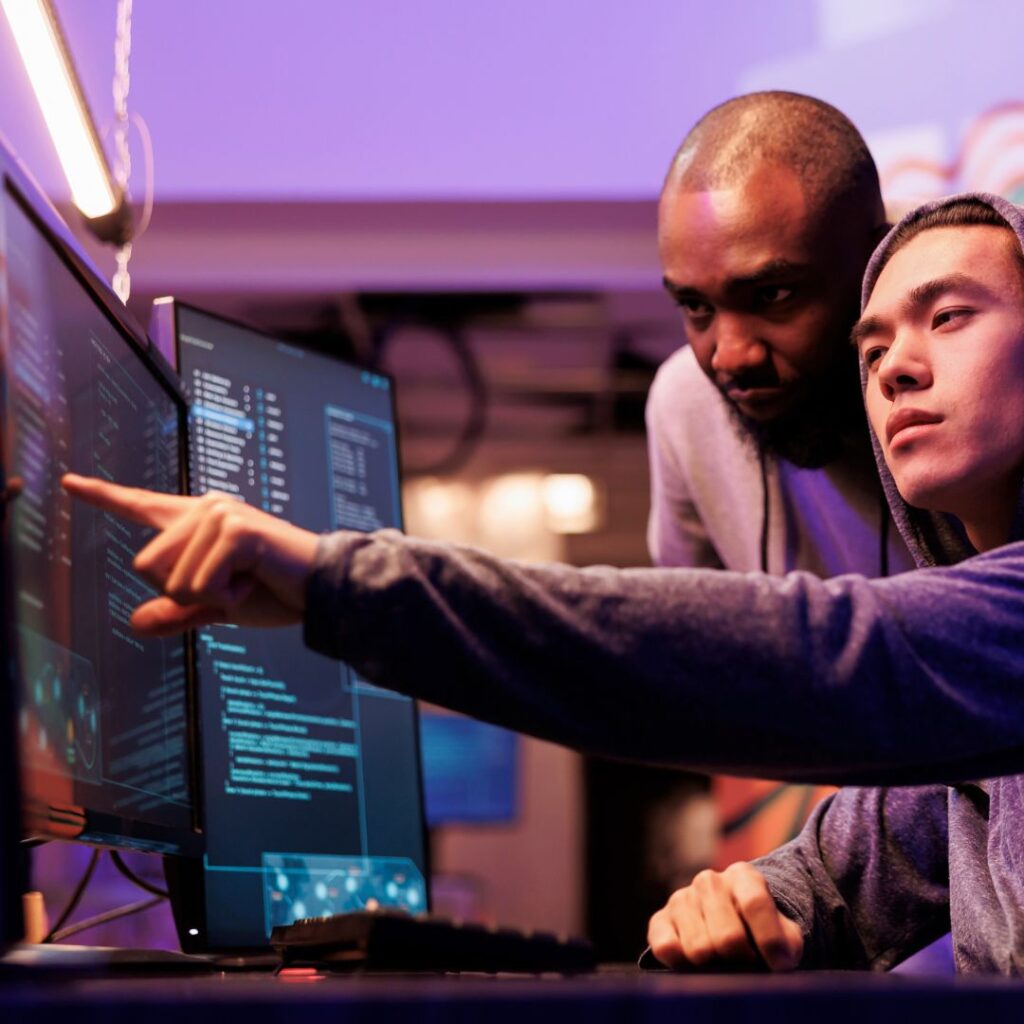 two guys at a computer